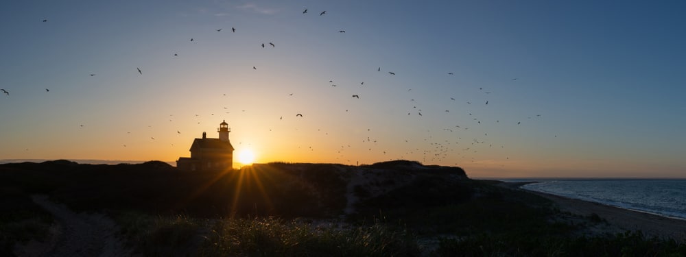 Beautiful sunset on the Block Island Lighthouses, a romantic place to spend a New England Getaway